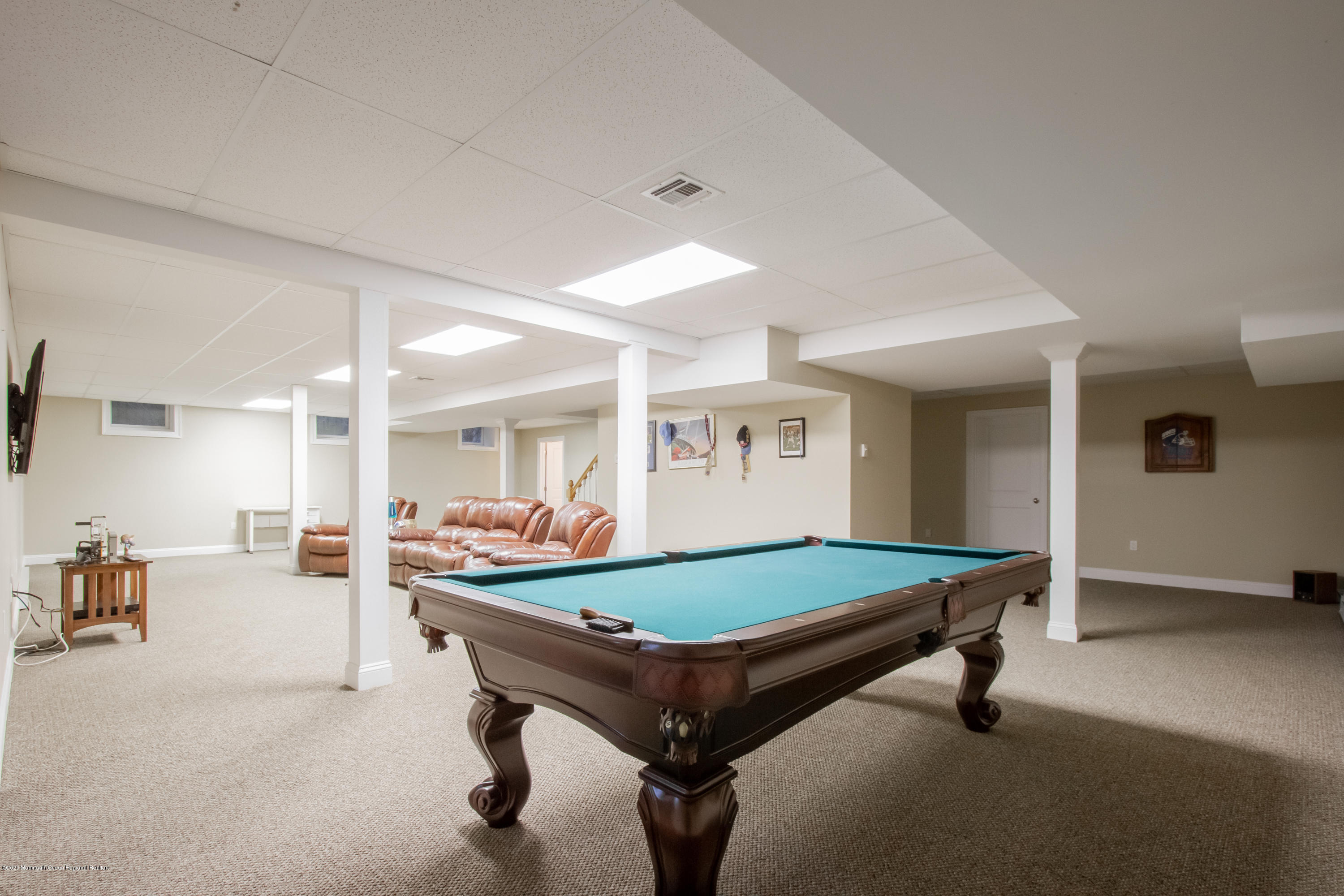 63 River Road Rumson, NJ 07760 - Photo 31 of 37 a room with pool table and windows
