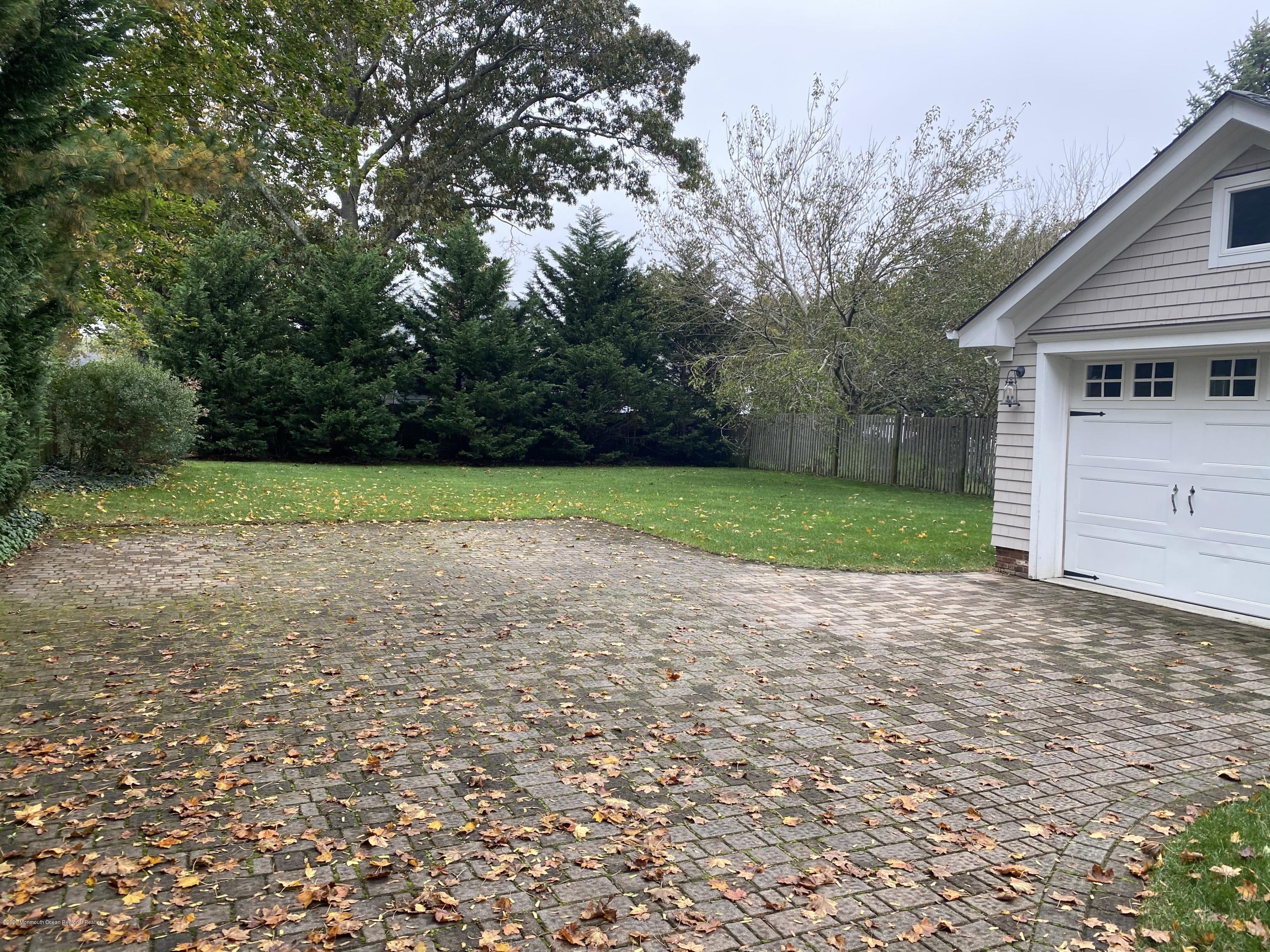 63 River Road Rumson, NJ 07760 - Photo 37 of 37 a view of a backyard of the house
