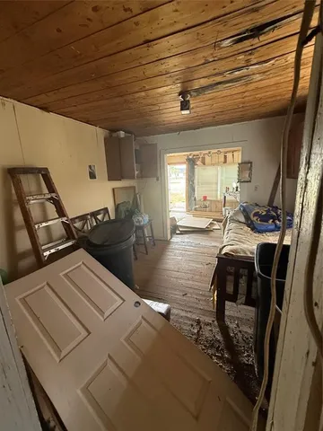 a living room with chairs