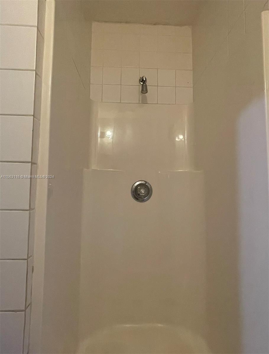 11810 Southwest 176th Street Miami, FL 33177 - Photo 15 of 15 a bathroom with a shower
