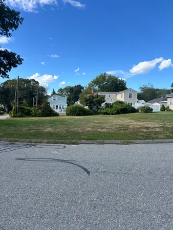 a view of a field with a big yard