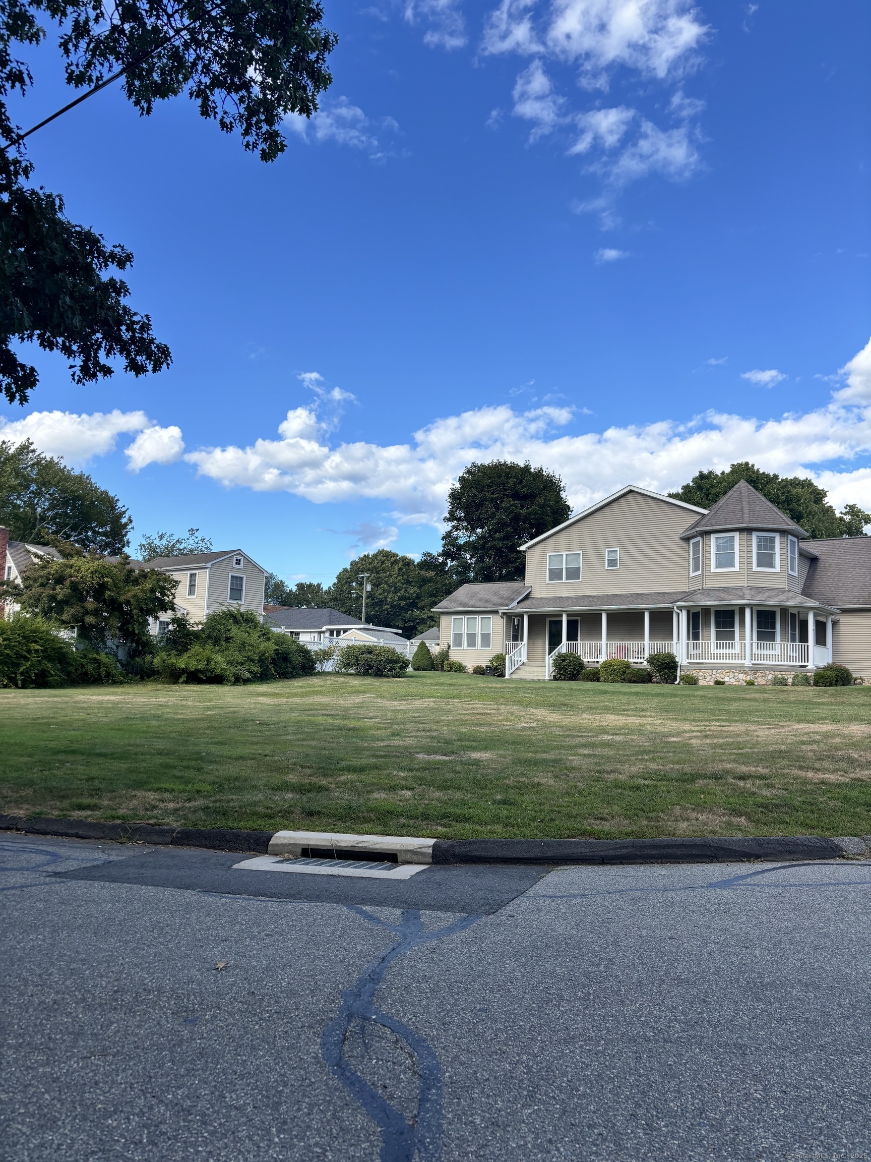 61 Whitecap Road East Lyme, CT 06357 - Photo 3 of 6 a front view of a house with a yard