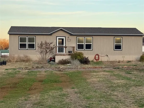 a front view of house with yard