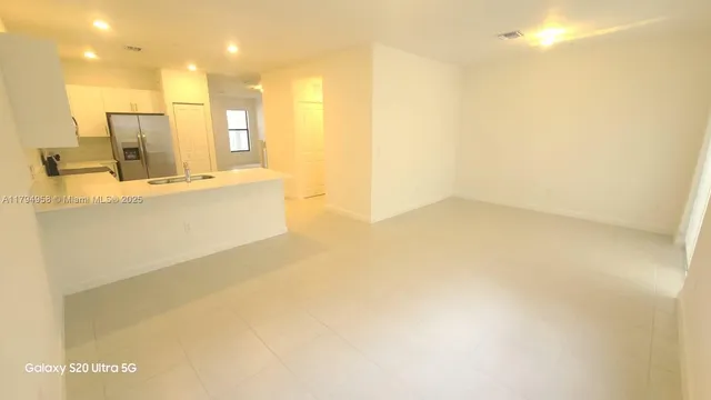 a view of a bathroom with a bathtub