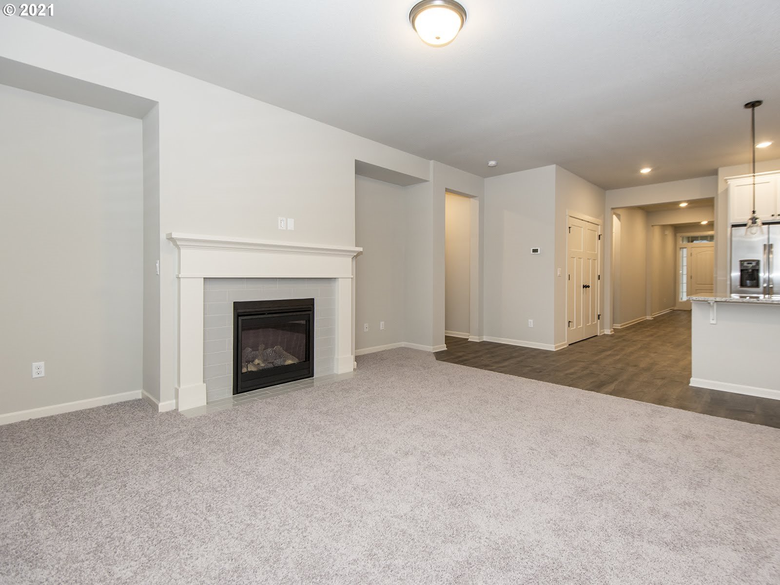 3712 South 42nd Place Ridgefield, WA 98642 - Photo 14 of 29 a view of an empty room with a fireplace