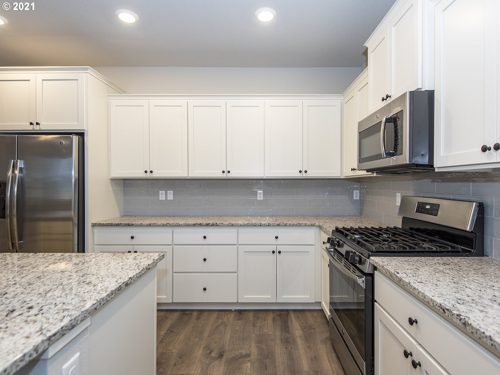 3712 South 42nd Place Ridgefield, WA 98642 - Photo 21 of 29 a kitchen with granite countertop a cabinets and steel stainless steel appliances