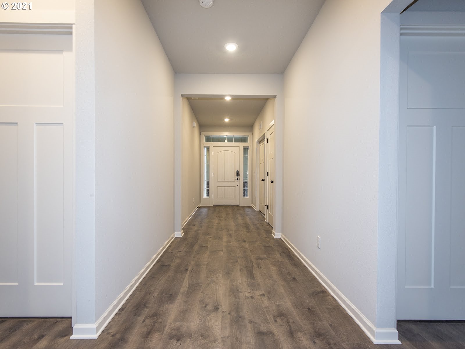 3712 South 42nd Place Ridgefield, WA 98642 - Photo 9 of 29 a view of a hallway with wooden floor