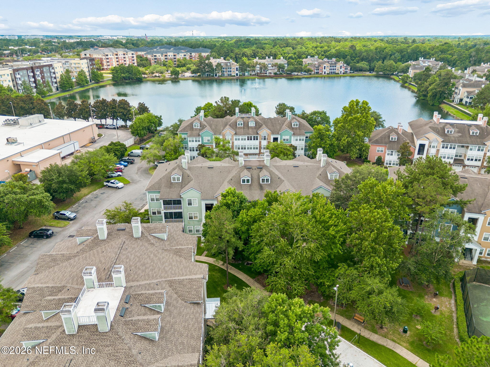 8550 Touchton Road, Unit 511 Jacksonville, FL 32216 - Photo 39 of 63 an aerial view of a house with outdoor space and lake view