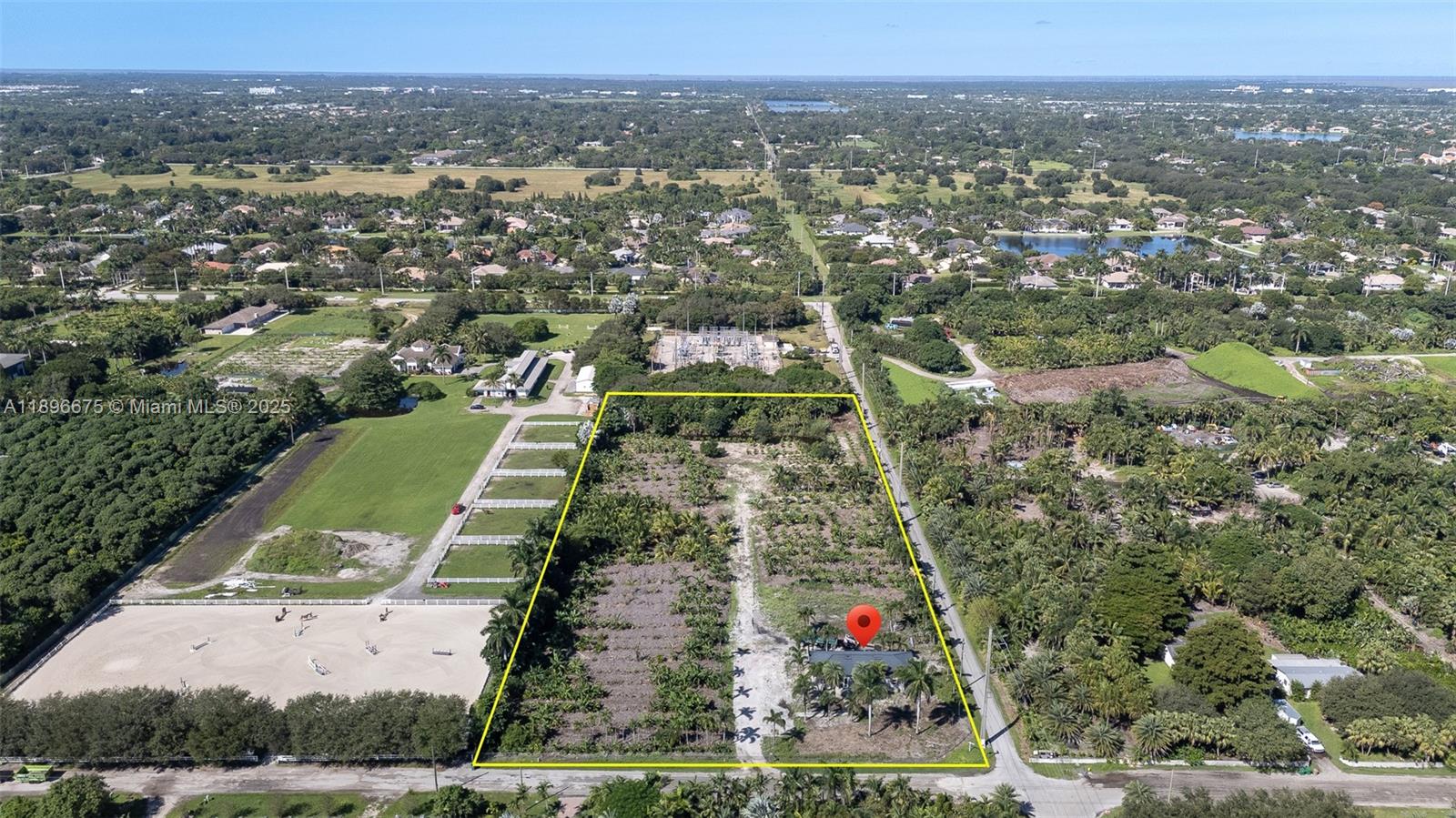 2045 Southwest 127th Avenue Davie, FL 33325 - Photo 6 of 7 an aerial view of residential houses with outdoor space and trees
