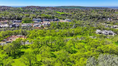 a view of a yard with an outdoor space