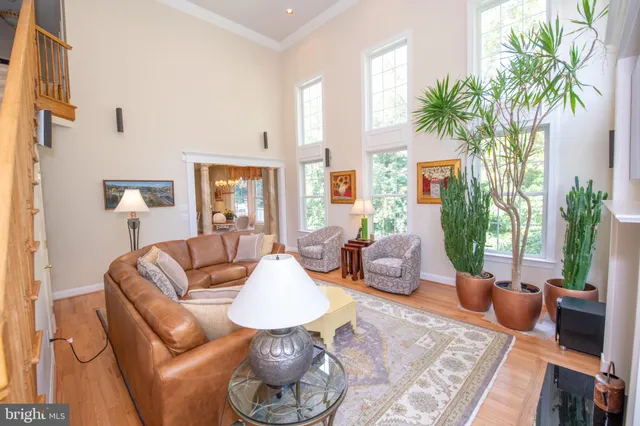 a bathroom with a toilet sink vanity and mirror