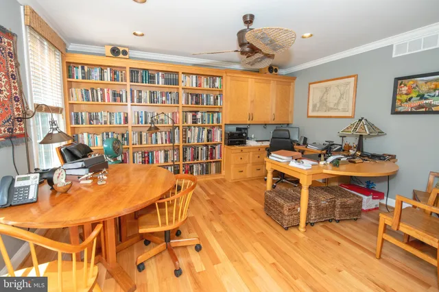 a spacious bedroom with a bed and a couch