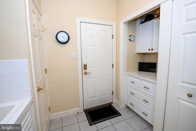 a spacious bathroom with a tub and a shower