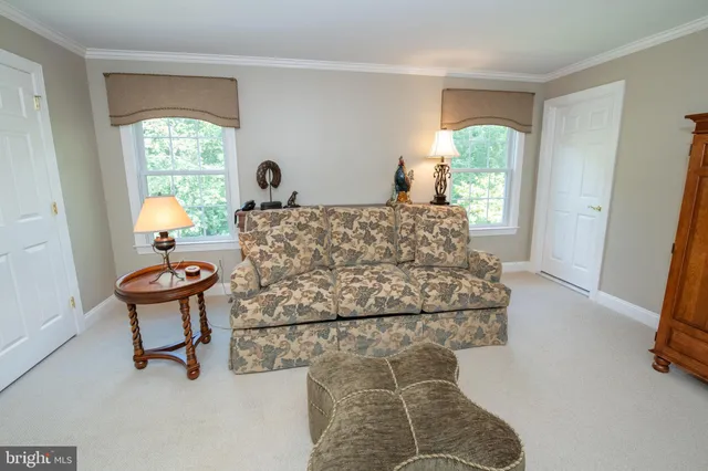 a view of a chair and table on the wooden floor