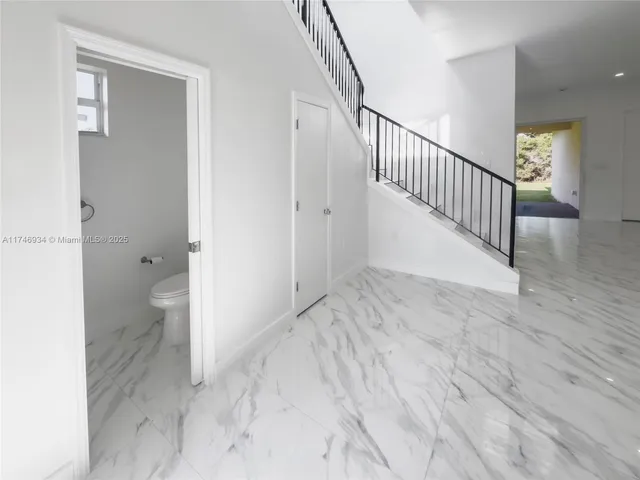 a kitchen with a stove and a microwave