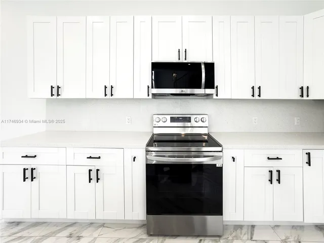a large bathroom with a sink and a mirror