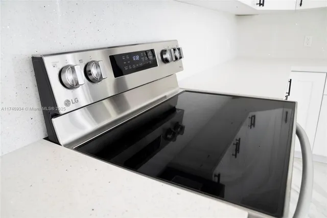 a picture of a bathroom with a shower