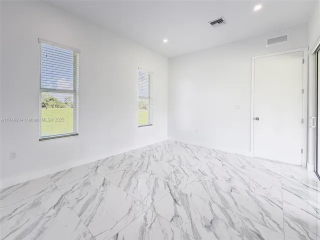a view of staircase with white walls and white walls