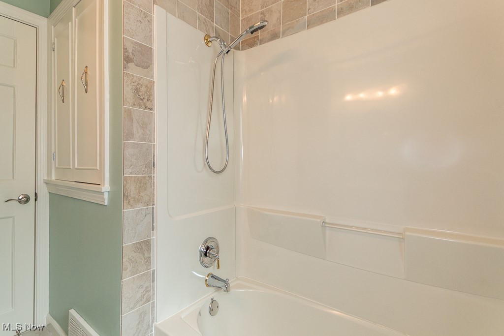 1237 Mayfield Ridge Road Cleveland, OH 44124 - Photo 23 of 38 Bathroom with washtub / shower combination