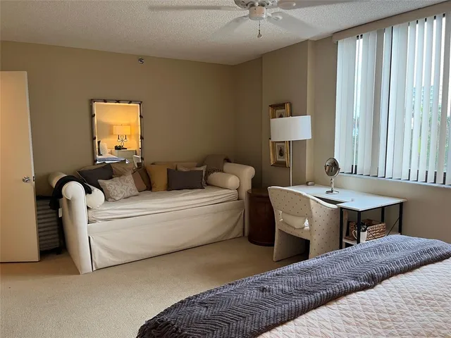 a living room with a couch and a table