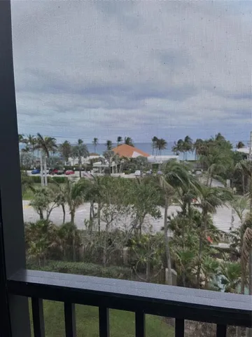 a view of a lake from a balcony