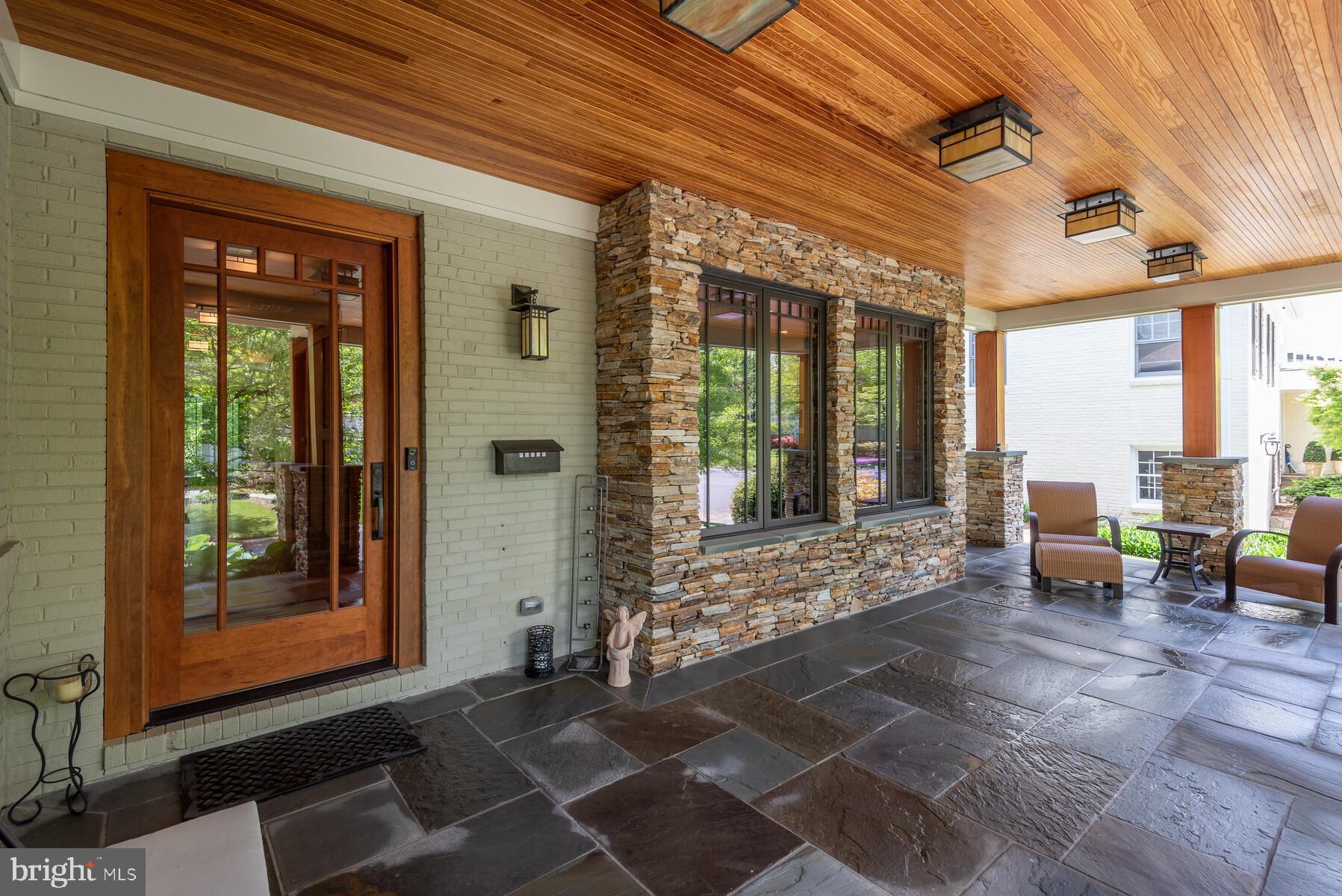 5631 Newington Road Bethesda, MD 20816 - Photo 9 of 96 Impressive front door and period lighting fixtures
