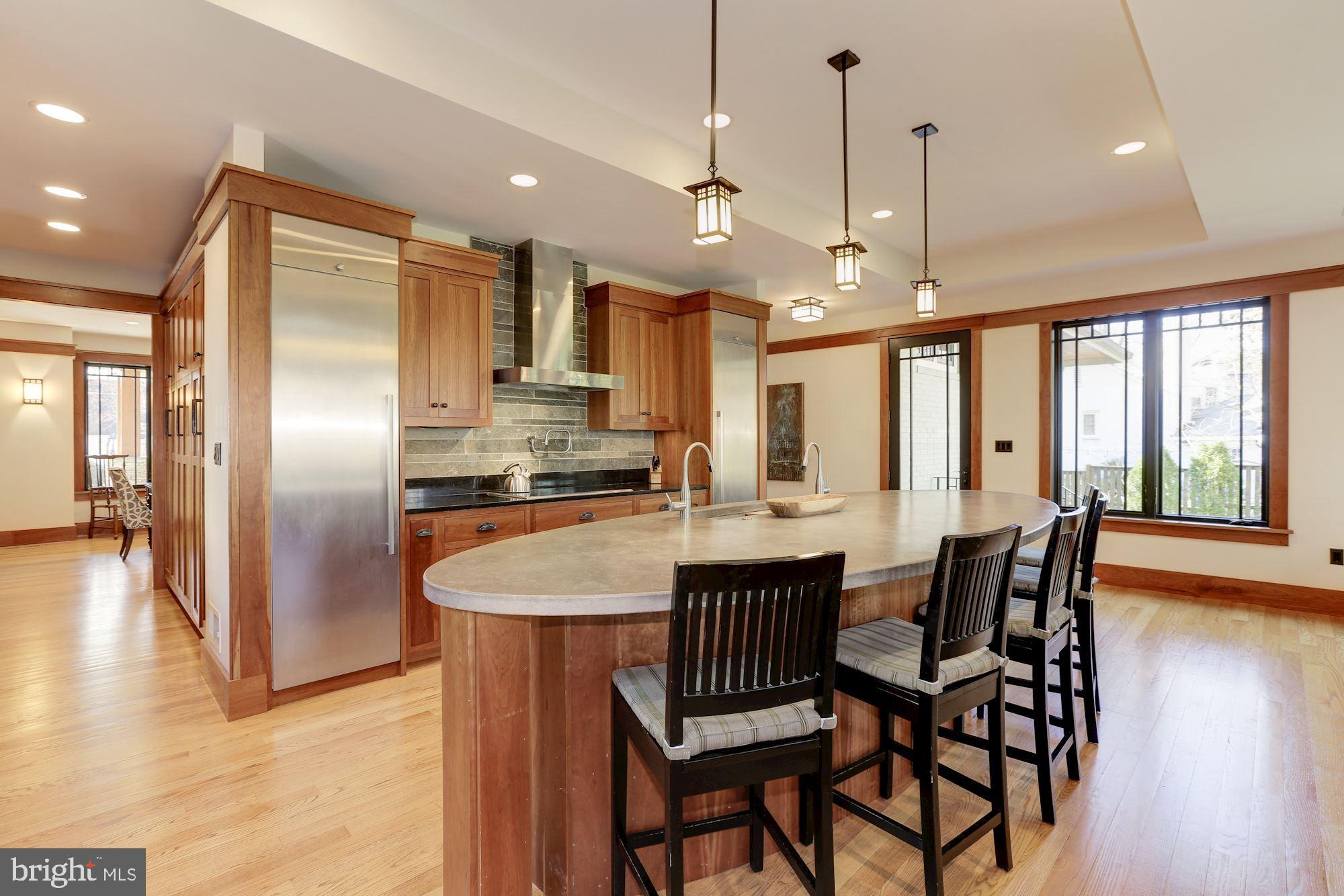 5631 Newington Road Bethesda, MD 20816 - Photo 10 of 96 Kitchen island with stainless steel appliances