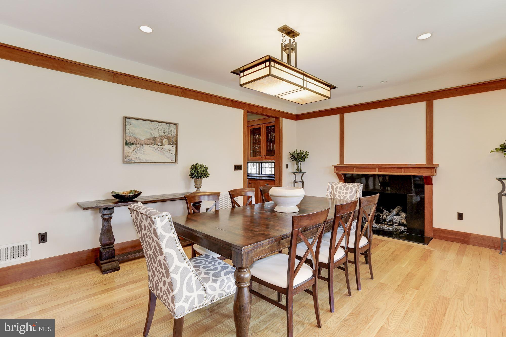 5631 Newington Road Bethesda, MD 20816 - Photo 25 of 96 Dining room with gas fireplace insert (toasty)