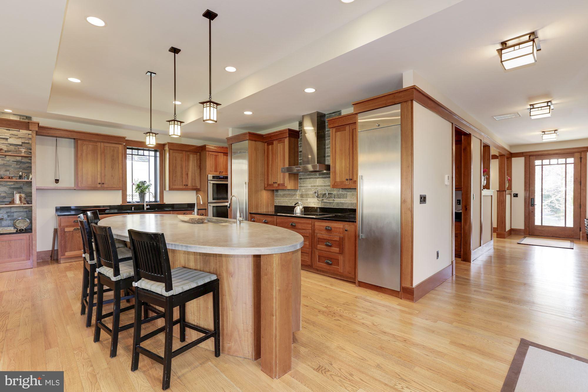 5631 Newington Road Bethesda, MD 20816 - Photo 4 of 96 Large specialty concrete oval island with sink