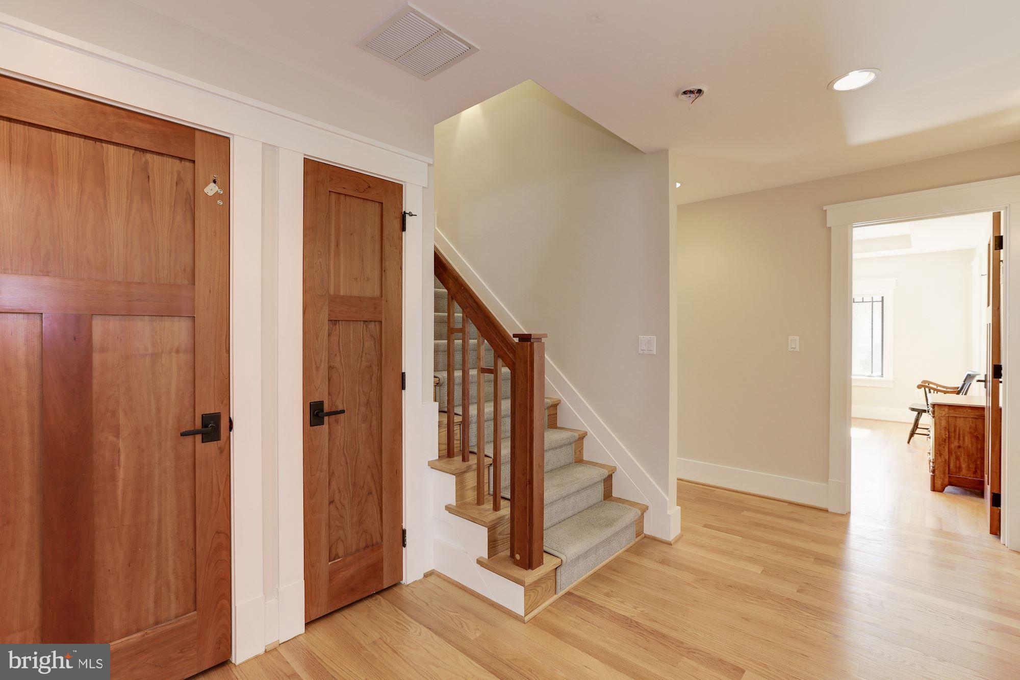 5631 Newington Road Bethesda, MD 20816 - Photo 34 of 96 Landing with staircase to upper floor #2