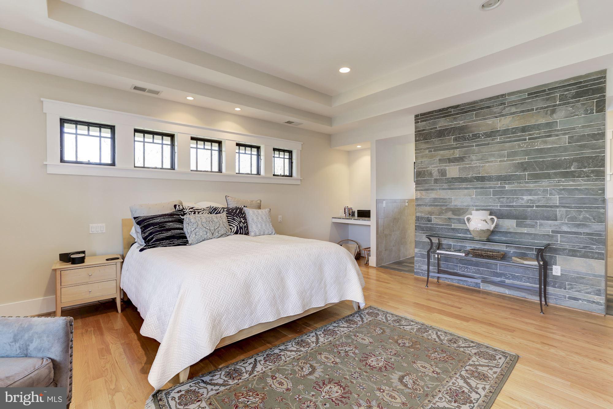 5631 Newington Road Bethesda, MD 20816 - Photo 35 of 96 Primary bedroom suite with floor to ceiling tile