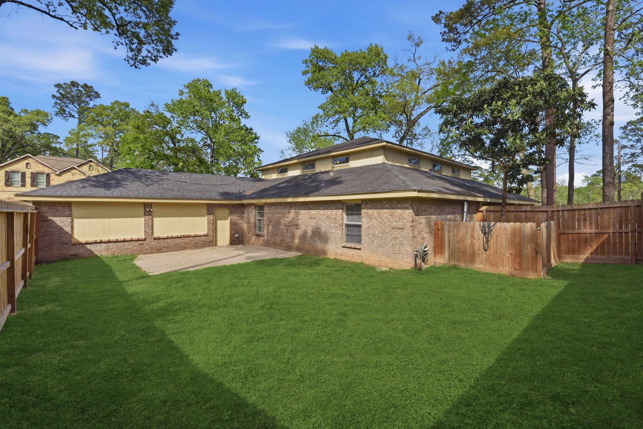9052 Zapata Way Willis, TX 77378 - Photo 45 of 45 a view of a yard with a house in the background