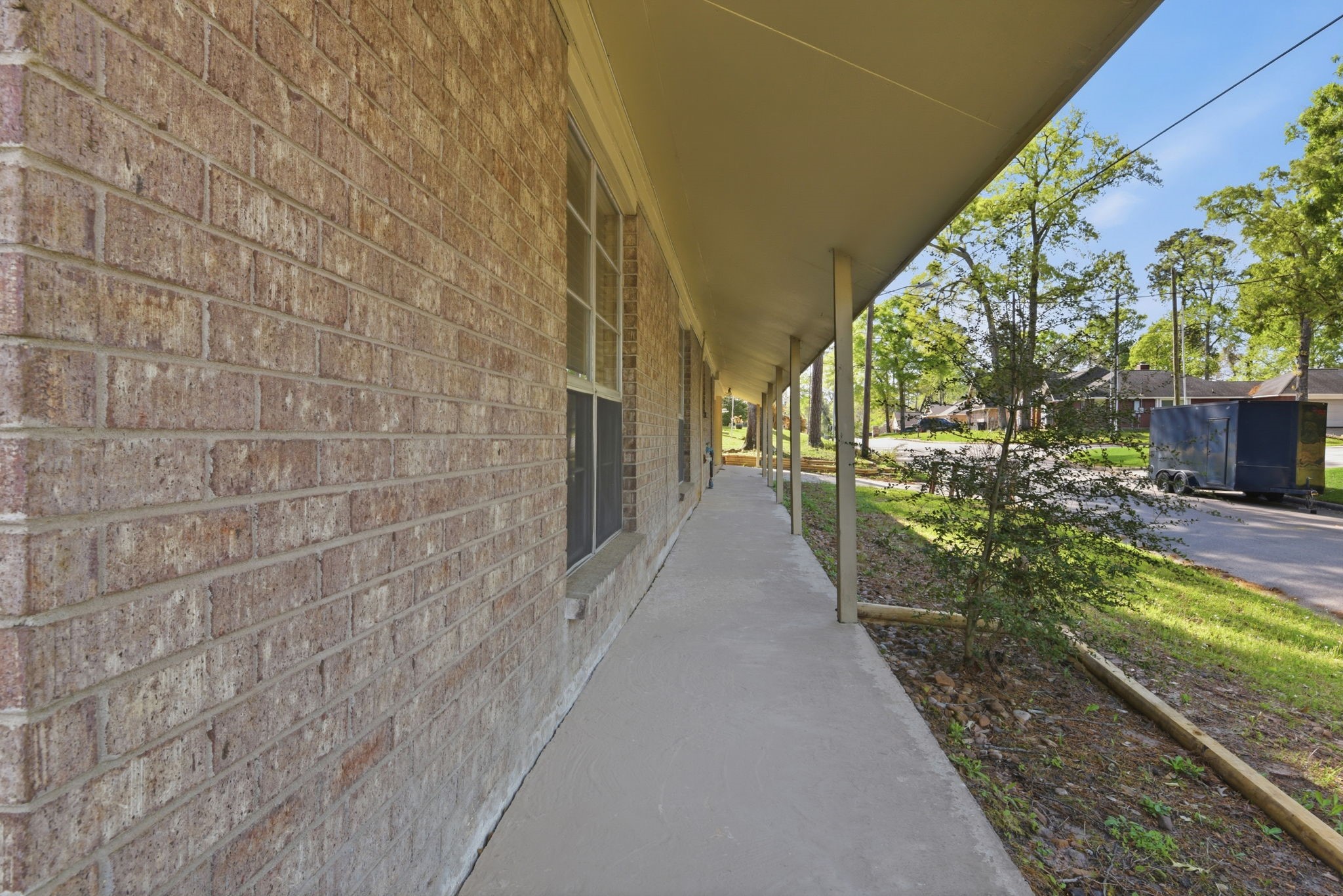 9052 Zapata Way Willis, TX 77378 - Photo 5 of 45 a view of a pathway both side of house