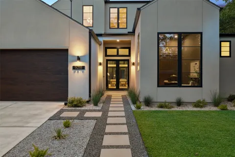 a front view of a house having yard