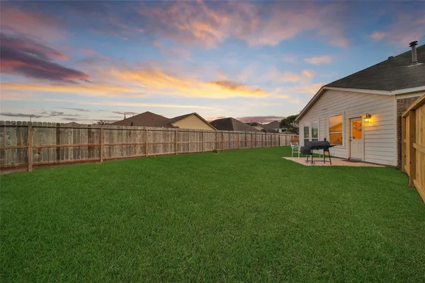 a view of a backyard with garden