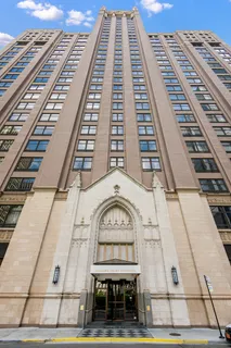 a living room with furniture window and lamp