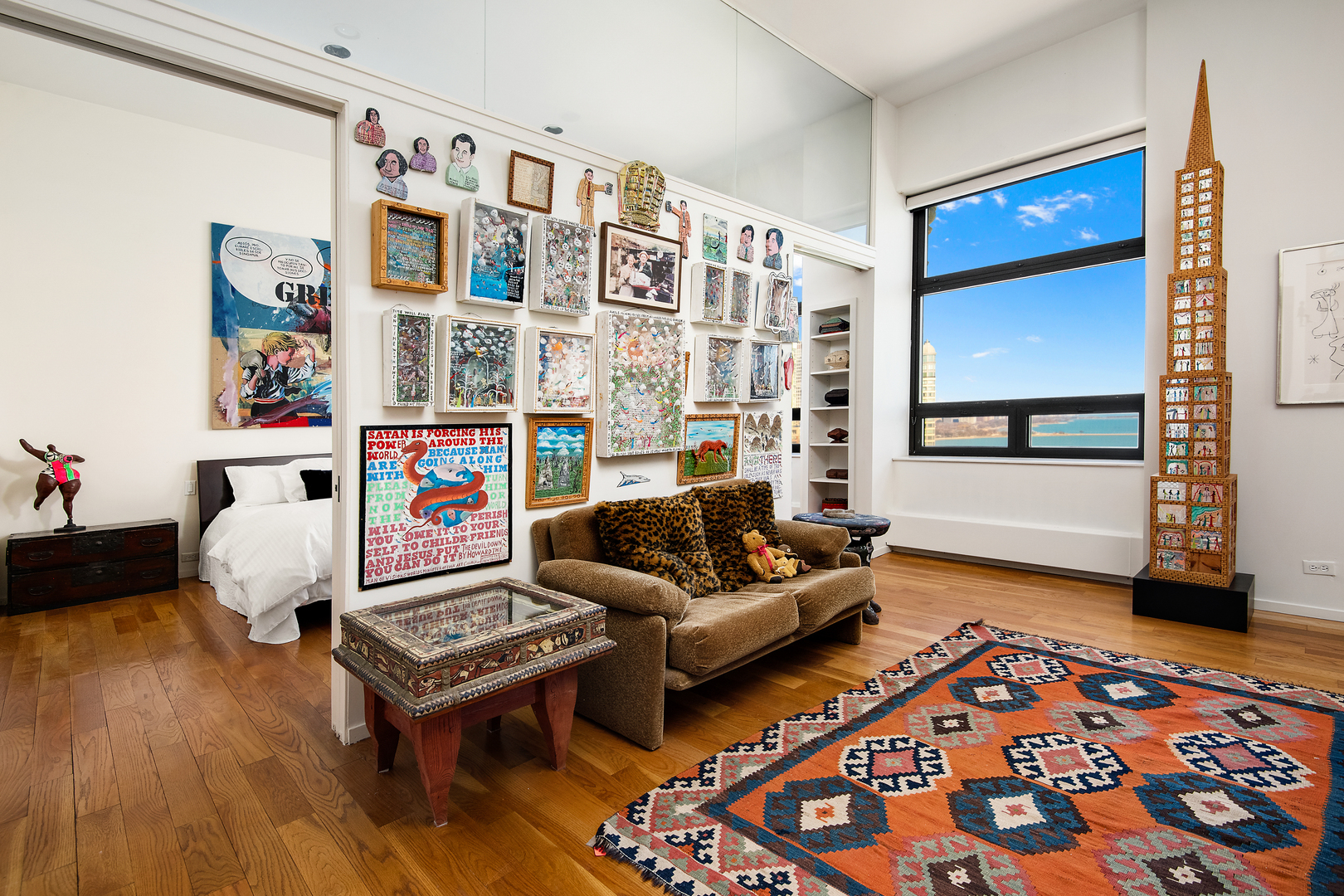 680 North Lake Shore Drive, Unit 1602 Chicago, IL 60611 - Photo 13 of 30 a living room with furniture and a rug