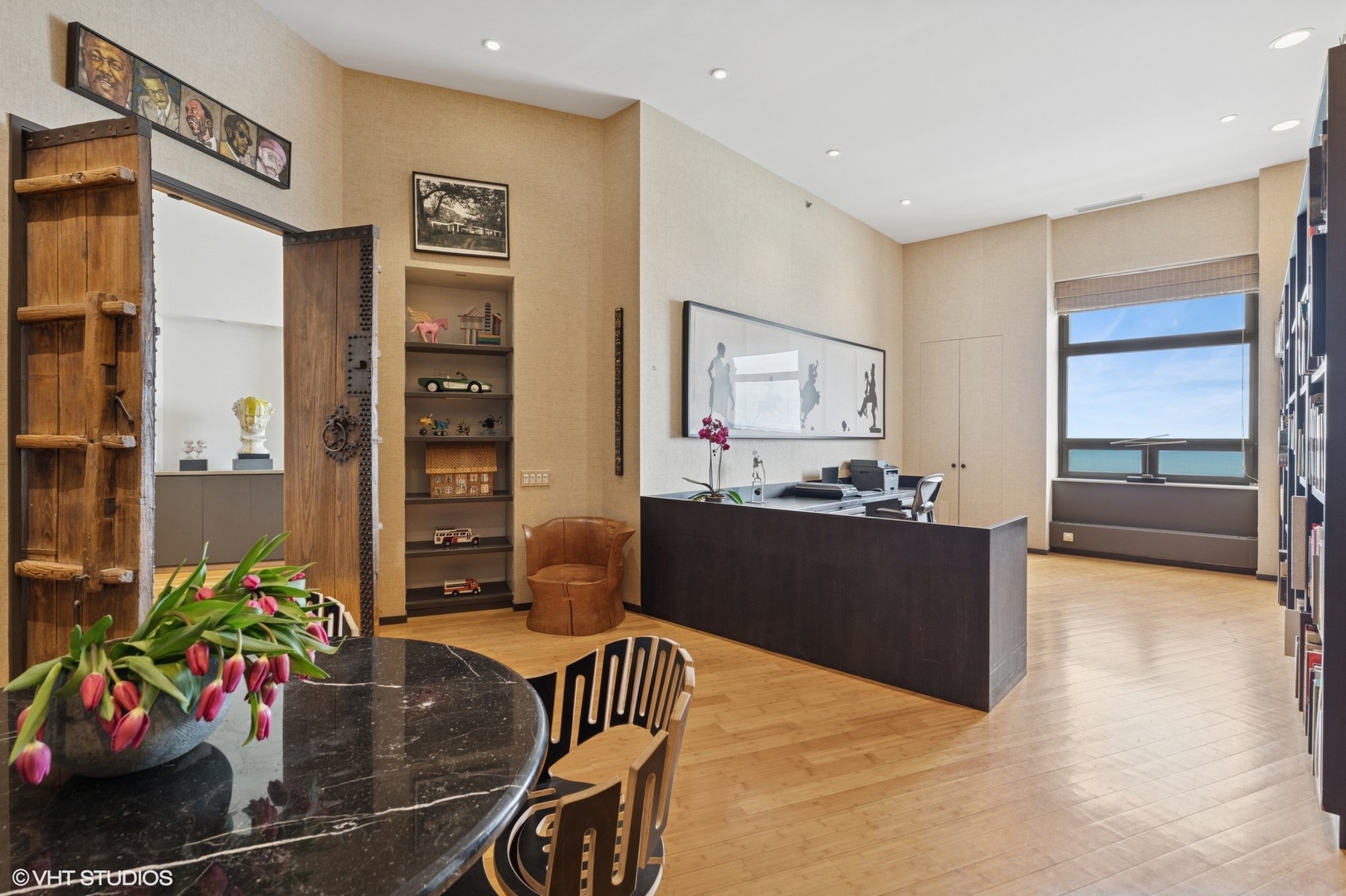 680 North Lake Shore Drive, Unit 1602 Chicago, IL 60611 - Photo 20 of 30 a living room with furniture and a kitchen