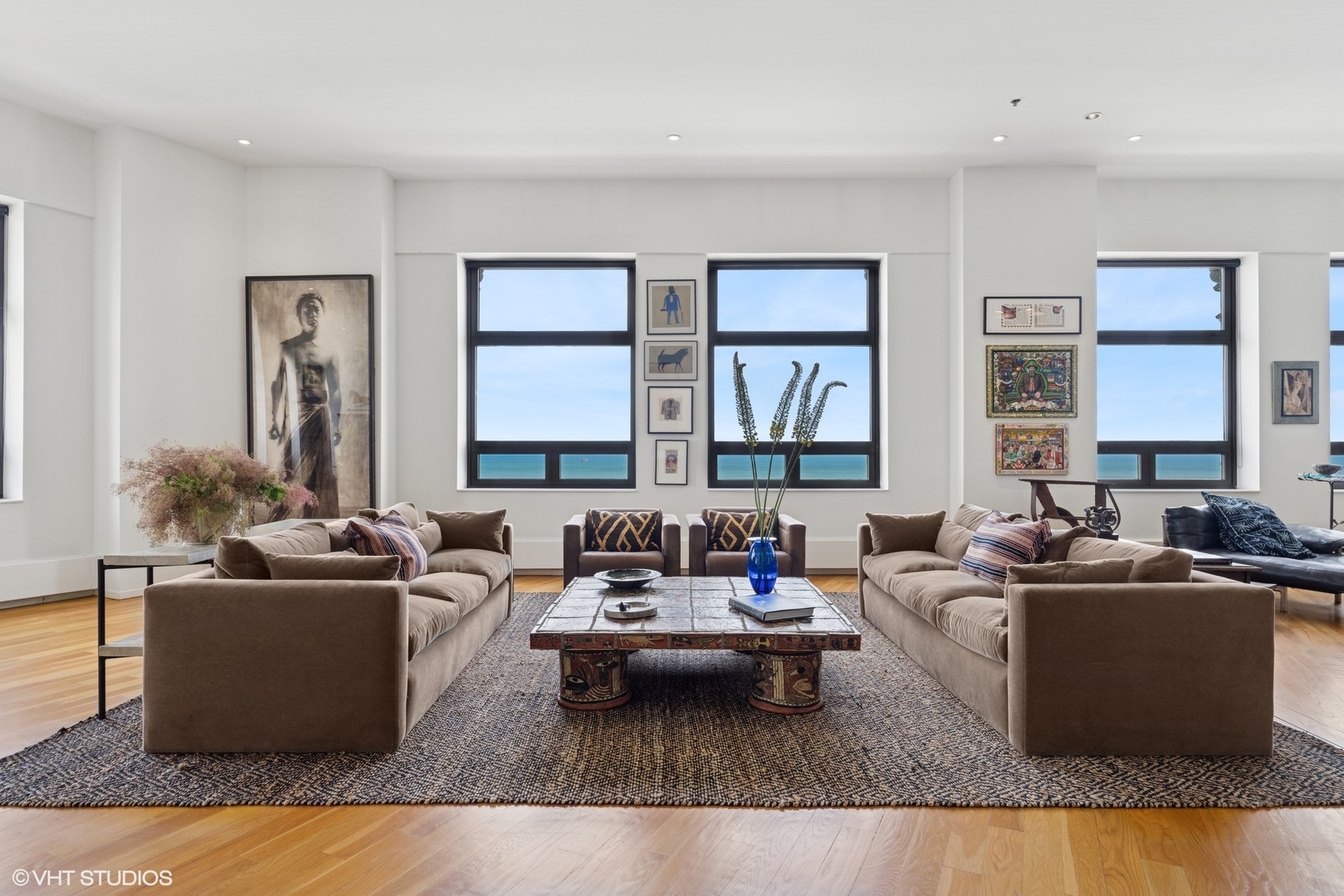 680 North Lake Shore Drive, Unit 1602 Chicago, IL 60611 - Photo 2 of 30 a living room with furniture window and lamp