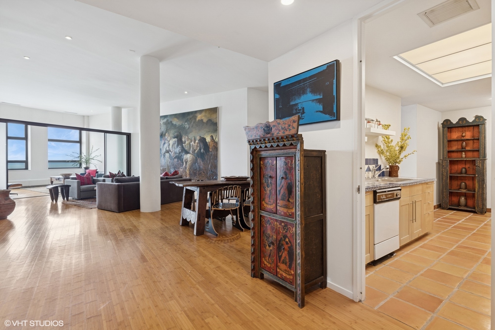 680 North Lake Shore Drive, Unit 1602 Chicago, IL 60611 - Photo 23 of 30 a kitchen with stainless steel appliances a refrigerator and a stove top oven
