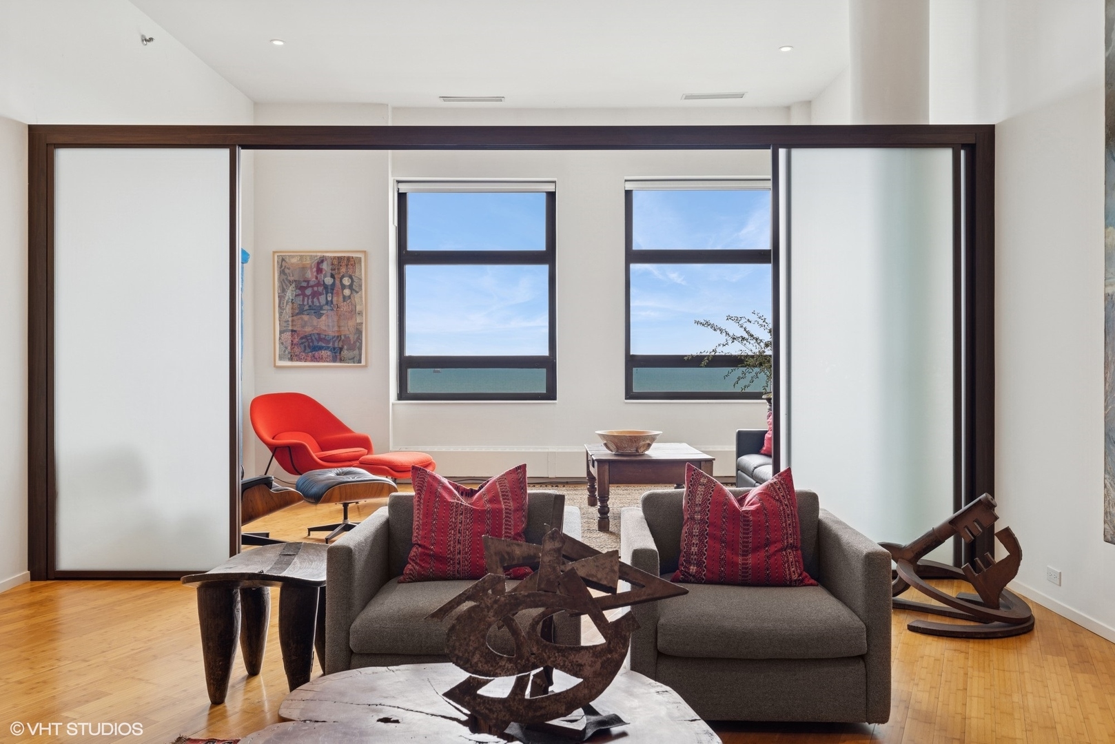 680 North Lake Shore Drive, Unit 1602 Chicago, IL 60611 - Photo 25 of 30 a living room with furniture and wooden floor