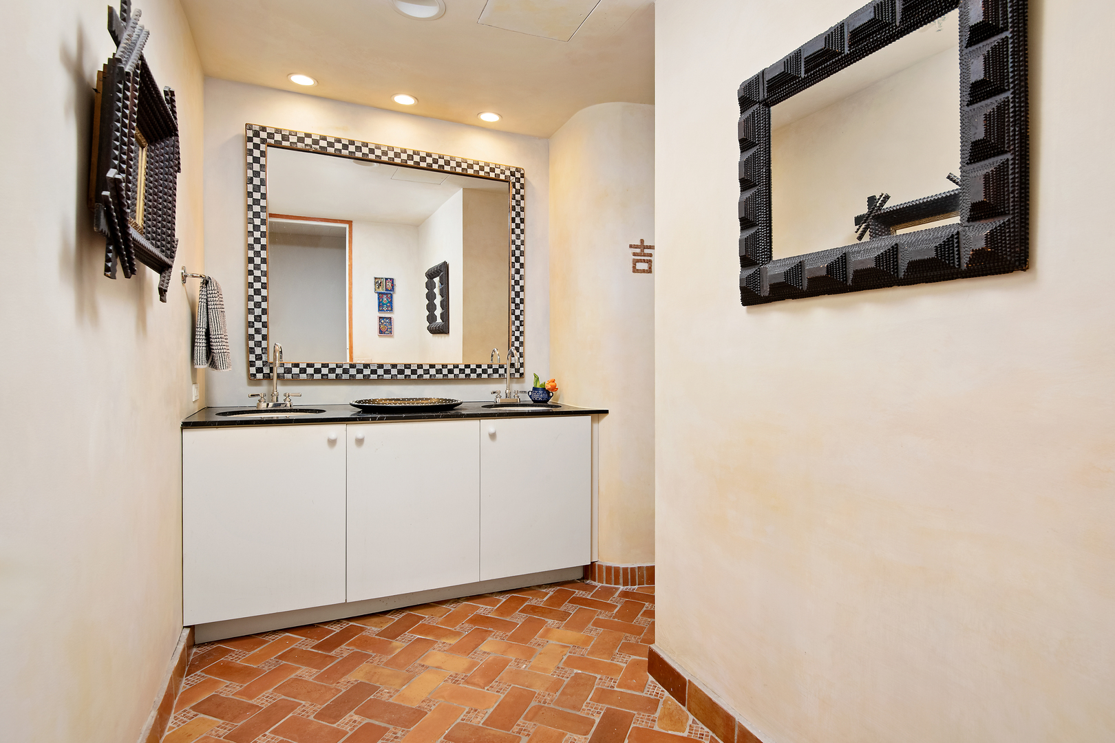 680 North Lake Shore Drive, Unit 1602 Chicago, IL 60611 - Photo 26 of 30 a view of a hallway with a large mirror and a wooden bench