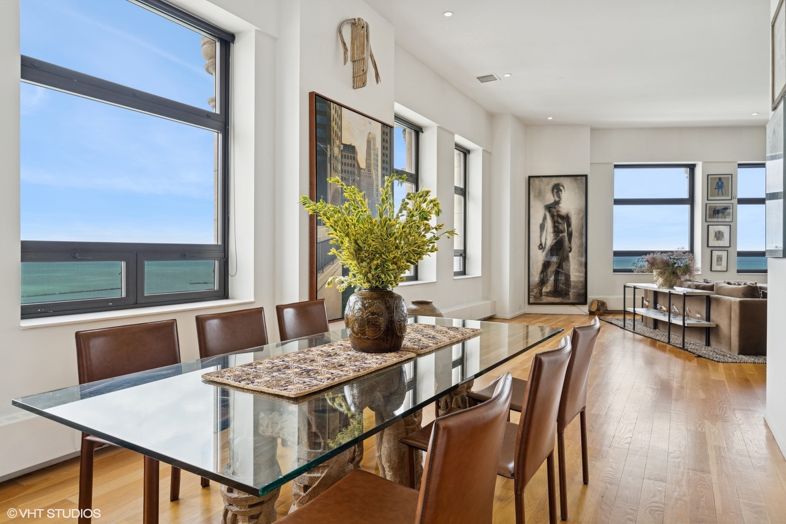 680 North Lake Shore Drive, Unit 1602 Chicago, IL 60611 - Photo 7 of 30 a view of a dining room with furniture and window
