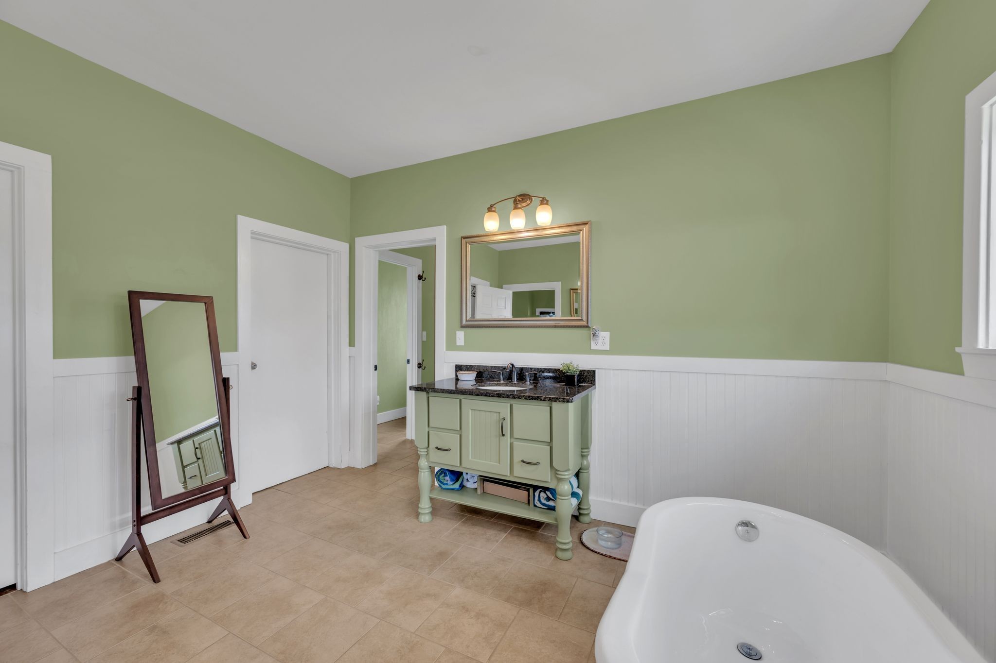 39 Fayetteville Road Kelso, TN 37348 - Photo 27 of 75 a bathroom with a sink mirror and a toilet