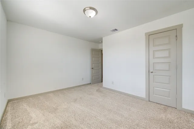 an empty room with closet