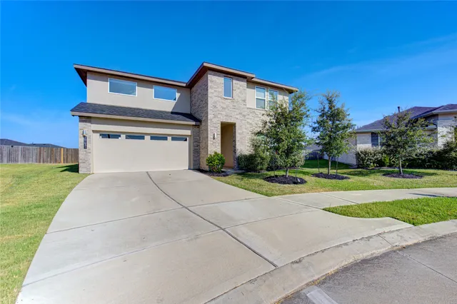 a house view with a outdoor space