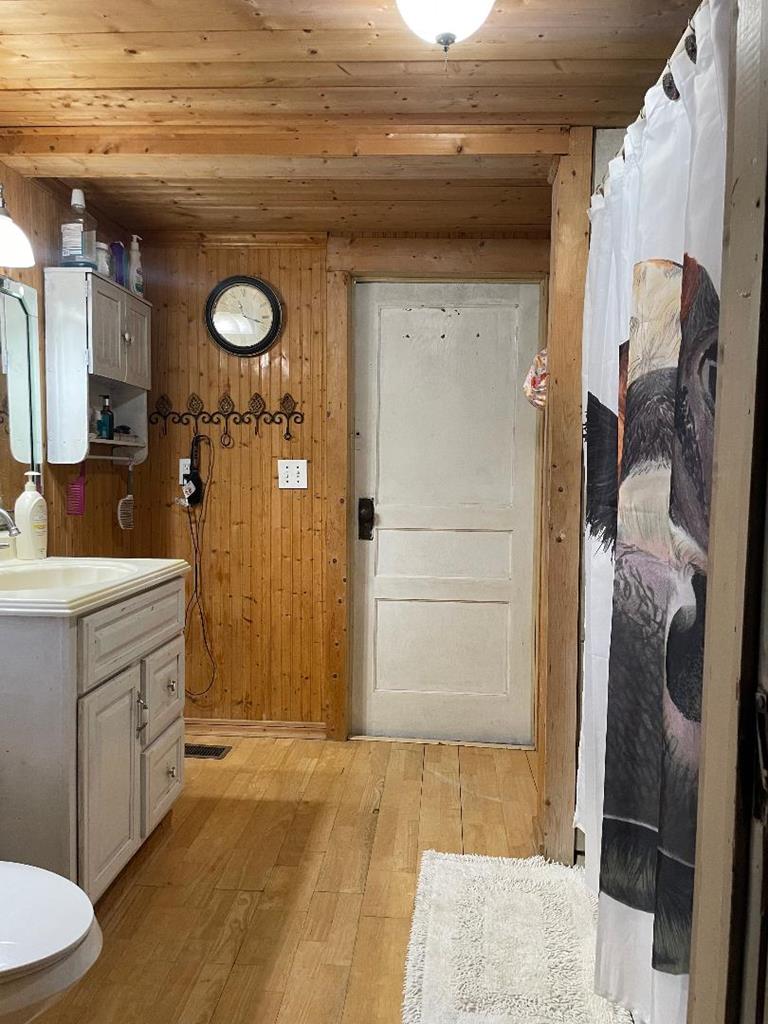 13 Lakeridge Road Seale, AL 36875 - Photo 12 of 24 a bathroom with a sink a toilet and shower