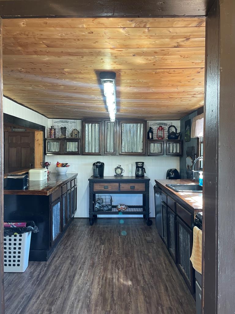 13 Lakeridge Road Seale, AL 36875 - Photo 6 of 24 a large kitchen with stainless steel appliances a stove a sink dishwasher and a oven with cabinets