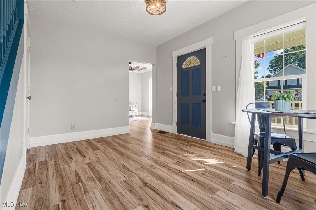 21 South 3rd Street Rittman, OH 44270 - Photo 8 of 39 Foyer with light wood finished floors and baseboards