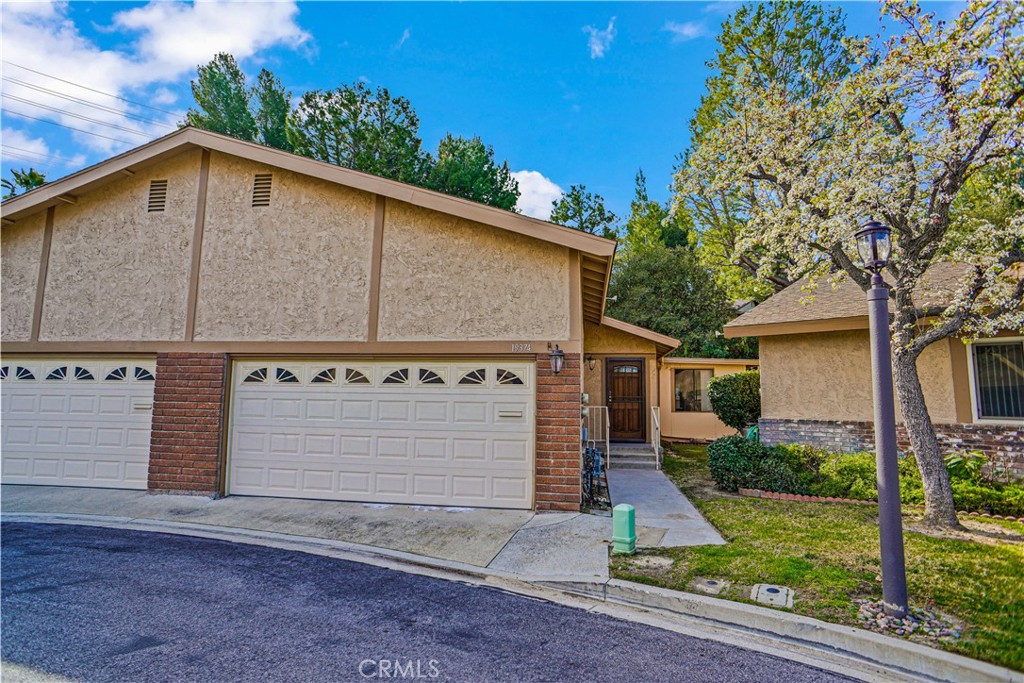 19374 Anzel Circle Newhall, CA 91321 - Photo 1 of 1 front view of a house with a yard